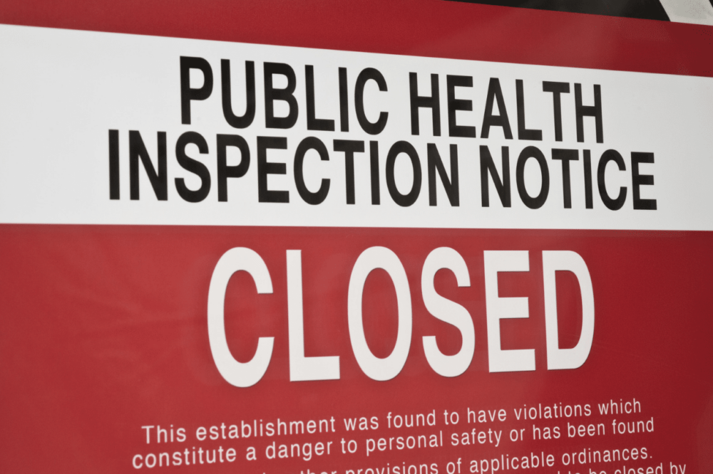 public health inspection notice of closure on restaurant door
